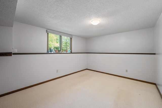 17915 17th Ave N, Plymouth, MN 55447 - empty room with light carpet, a textured ceiling, and baseboards