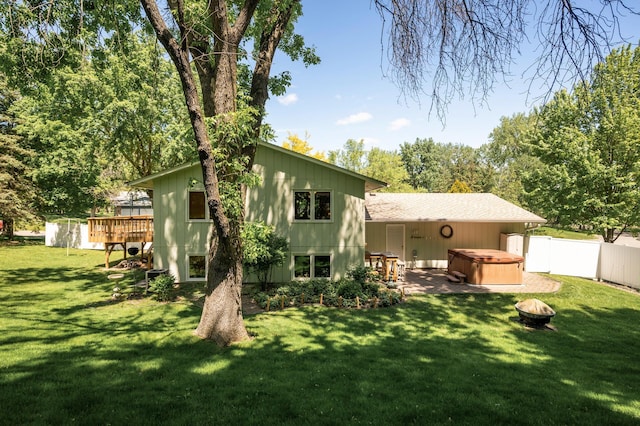 17915 17th Ave N, Plymouth, MN 55447 - back of house featuring a hot tub and a deck