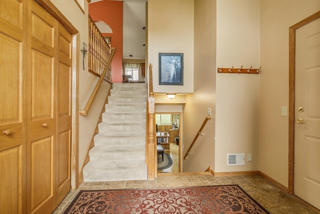28610 Bay Shore Dr NW, Isanti, MN 55040 - foyer featuring baseboards and stairs