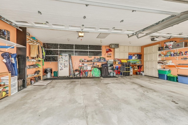 28610 Bay Shore Dr NW, Isanti, MN 55040 - garage with a garage door opener