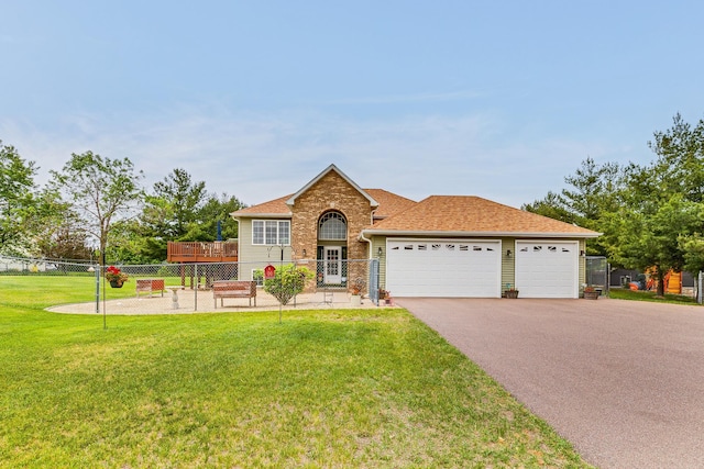 28610 Bay Shore Dr NW, Isanti, MN 55040 - view of front facade with a garage, asphalt driveway, and a shingled roof