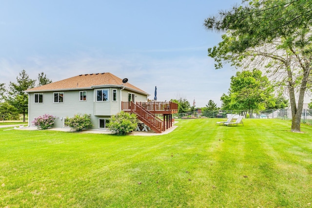 28610 Bay Shore Dr NW, Isanti, MN 55040 - view of yard with stairway and a wooden deck