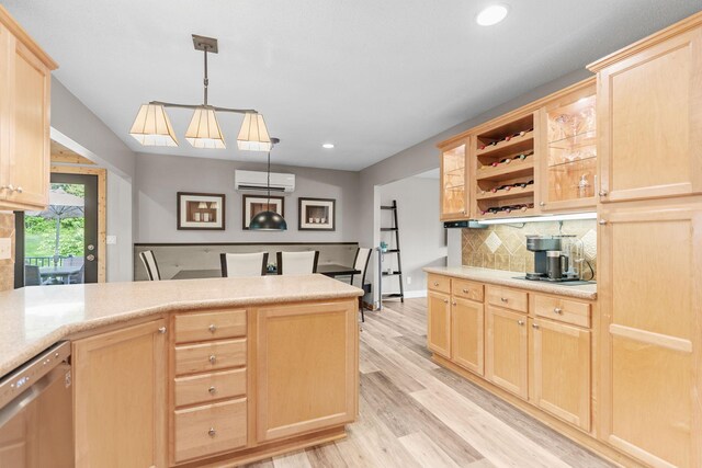 8150 Wildwood Rd, Laketown Twp, MN 55387 - kitchen with light brown cabinets, a wall mounted AC, stainless steel dishwasher, light wood-style floors, and recessed lighting