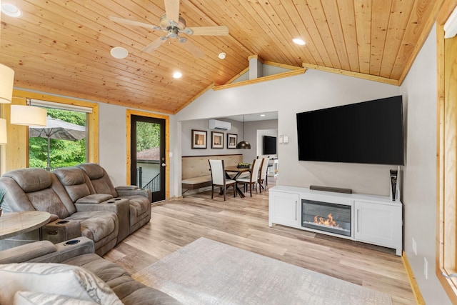 8150 Wildwood Rd, Laketown Twp, MN 55387 - living room with a wall mounted air conditioner, lofted ceiling, wood ceiling, light wood-style floors, and a ceiling fan