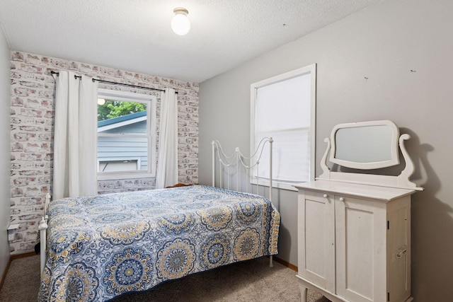 218 9 1/4 Ave, Turtle Lake, WI 54004 - carpeted bedroom featuring a textured ceiling and baseboards