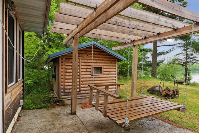 218 9 1/4 Ave, Turtle Lake, WI 54004 - view of outdoor structure featuring a pergola