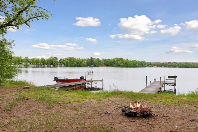 218 9 1/4 Ave, Turtle Lake, WI 54004 - dock with an outdoor fire pit and a water view