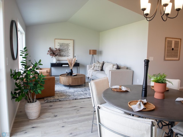 6321 83rd Ave S, Horace, ND 58047 - dining area featuring light wood-type flooring, a chandelier, and lofted ceiling