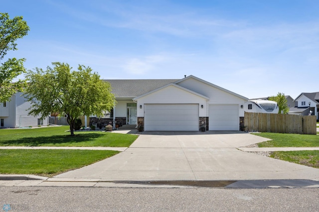 1095 Parkway Ln, West Fargo, ND 58078 - view of front facade featuring a garage and driveway