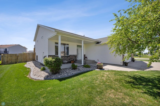 1095 Parkway Ln, West Fargo, ND 58078 - view of front facade featuring a patio and stone siding