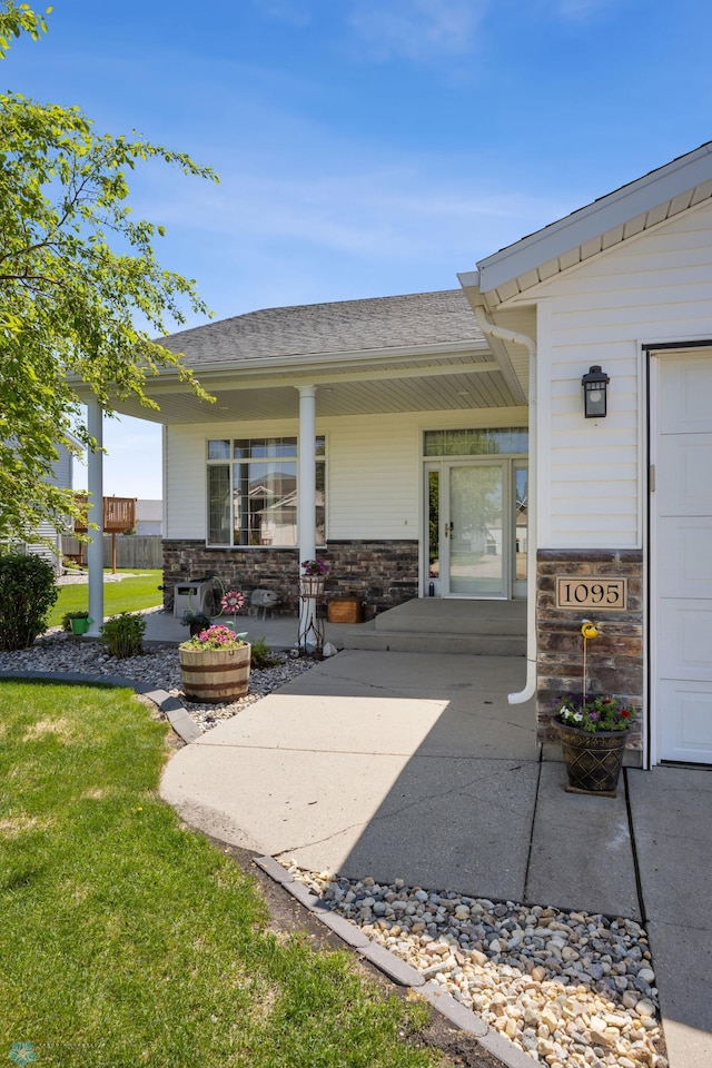 1095 Parkway Ln, West Fargo, ND 58078 - covered porch featuring a yard