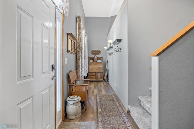 1095 Parkway Ln, West Fargo, ND 58078 - entryway featuring wood finished floors and stairway