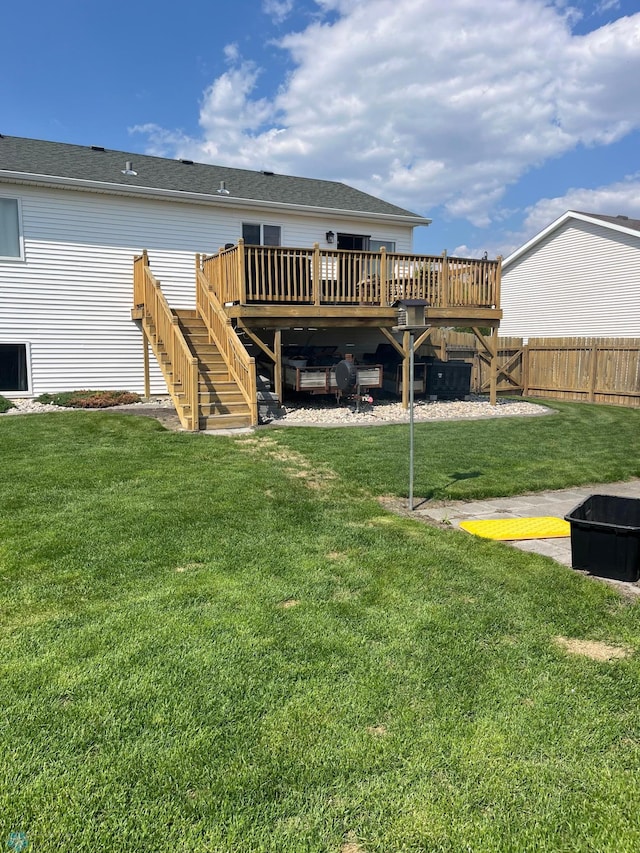 1095 Parkway Ln, West Fargo, ND 58078 - back of property with stairway and a wooden deck