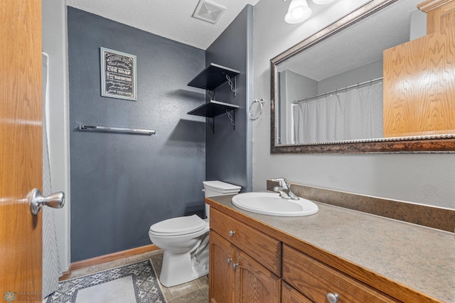 1095 Parkway Ln, West Fargo, ND 58078 - full bath with vanity, toilet, and tile patterned flooring
