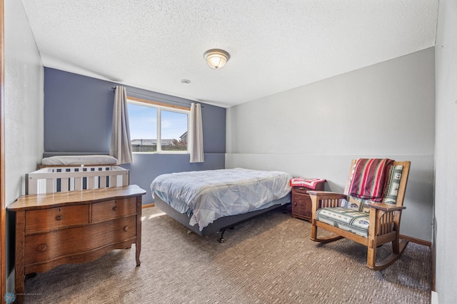 1095 Parkway Ln, West Fargo, ND 58078 - bedroom with carpet flooring, baseboards, and a textured ceiling