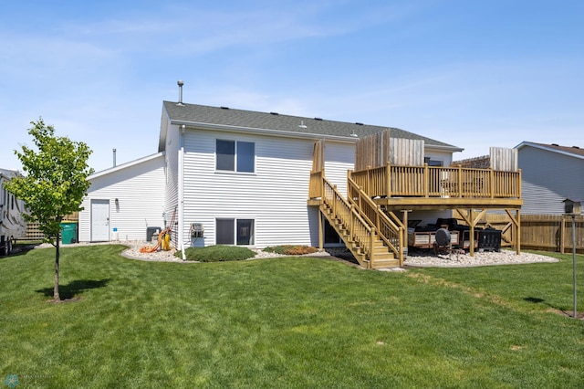 1095 Parkway Ln, West Fargo, ND 58078 - back of property with a wooden deck and stairway