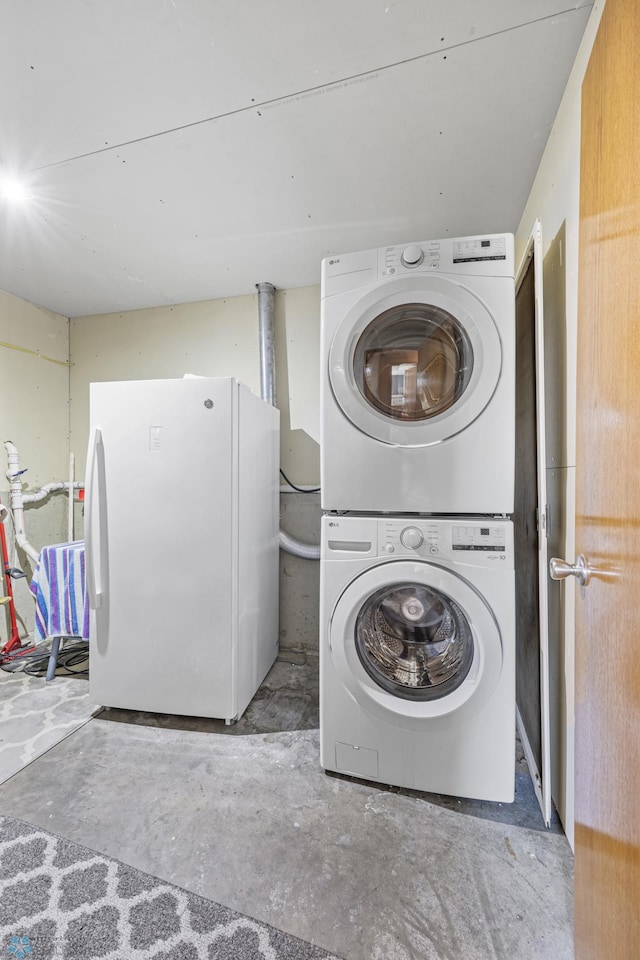 1095 Parkway Ln, West Fargo, ND 58078 - washroom featuring stacked washing machine and dryer