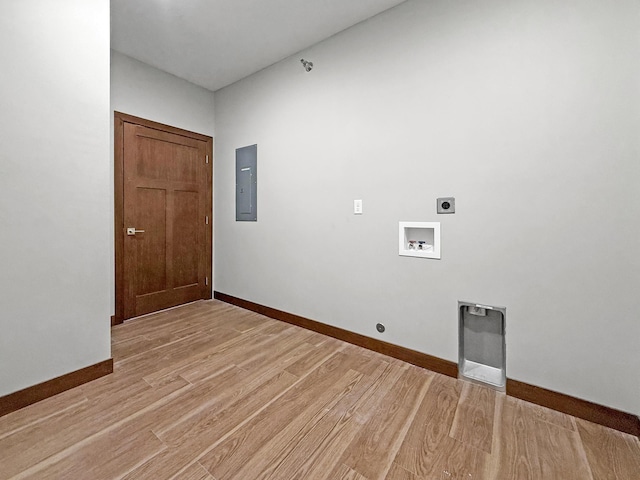 715 Lake Shore Dr NE Unit 214, Bemidji, MN 56601 - laundry room with electric panel, electric dryer hookup, light wood-style flooring, washer hookup, and baseboards