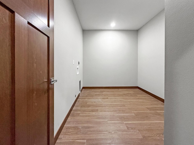 715 Lake Shore Dr NE Unit 214, Bemidji, MN 56601 - empty room featuring light wood-style flooring, baseboards, and recessed lighting