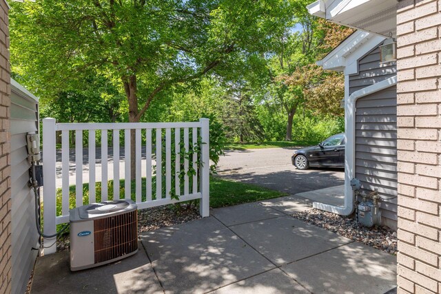 8379 Corcoran Cir Unit 47, Inver Grove Heights, MN 55076 - view of patio with central AC