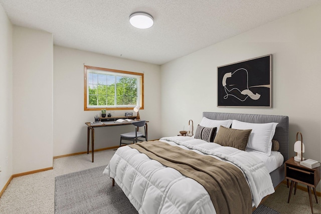 8379 Corcoran Cir Unit 47, Inver Grove Heights, MN 55076 - bedroom with a textured ceiling, a desk, carpet flooring, and baseboards