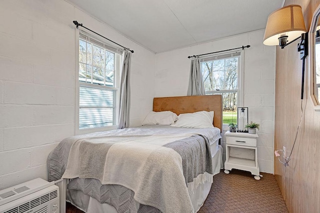 10777 70th St, Clear Lake, MN 55319 - bedroom featuring multiple windows, concrete block wall, and carpet