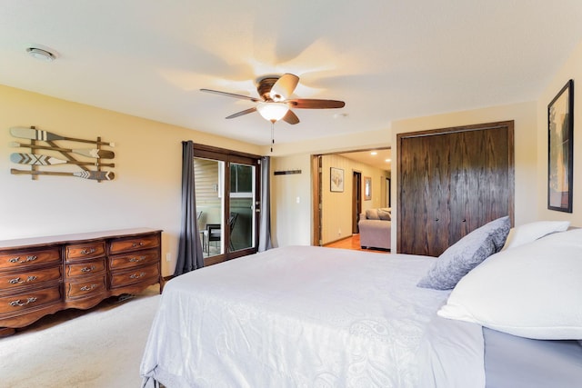 10432 102nd Pl, Maple Grove, MN 55369 - bedroom with access to outside, ceiling fan, light carpet, and two closets