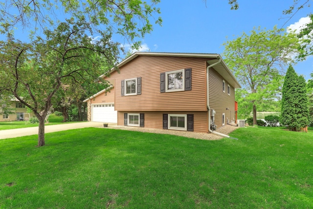 10432 102nd Pl, Maple Grove, MN 55369 - tri-level home featuring driveway, a front yard, and central AC unit