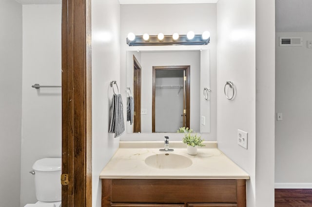 10441 Greenbrier Rd Unit 315, Minnetonka, MN 55305 - bathroom featuring vanity and toilet