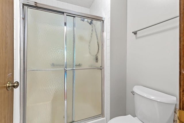10441 Greenbrier Rd Unit 315, Minnetonka, MN 55305 - bathroom featuring a shower stall and toilet
