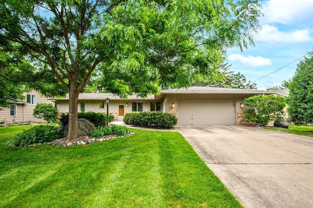 451 Reflection Rd, Apple Valley, MN 55124 - ranch-style house with a garage, concrete driveway, and a front lawn