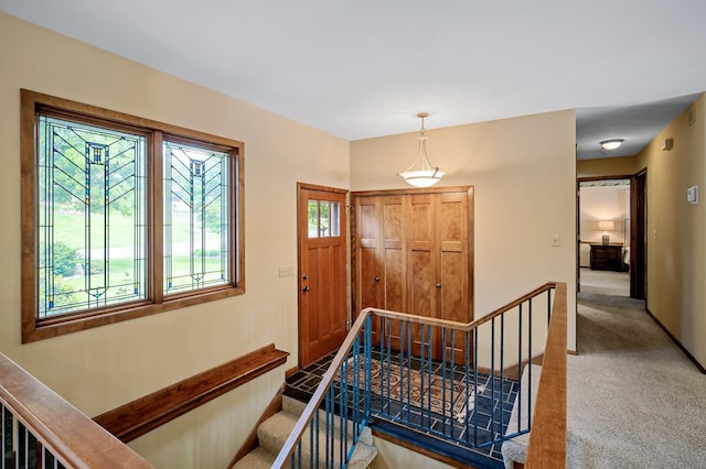 451 Reflection Rd, Apple Valley, MN 55124 - entryway with carpet and stairs