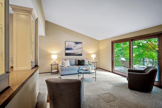 451 Reflection Rd, Apple Valley, MN 55124 - carpeted living room featuring vaulted ceiling and baseboards