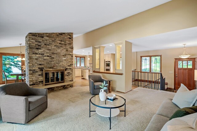 451 Reflection Rd, Apple Valley, MN 55124 - carpeted living area featuring lofted ceiling