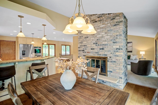 451 Reflection Rd, Apple Valley, MN 55124 - dining space featuring wood-type flooring, a fireplace, and recessed lighting