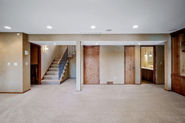 451 Reflection Rd, Apple Valley, MN 55124 - finished basement with carpet floors, stairs, and recessed lighting