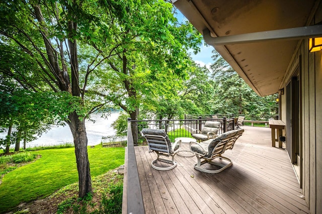 451 Reflection Rd, Apple Valley, MN 55124 - wooden terrace with a water view and a lawn
