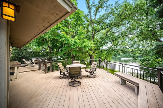 451 Reflection Rd, Apple Valley, MN 55124 - wooden terrace featuring a water view and outdoor dining area