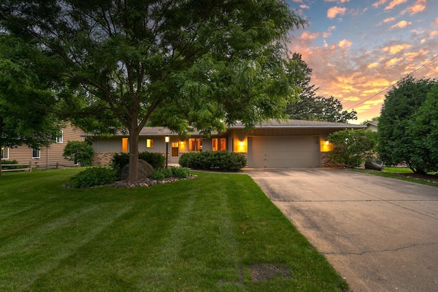 451 Reflection Rd, Apple Valley, MN 55124 - ranch-style house featuring an attached garage, driveway, and a lawn