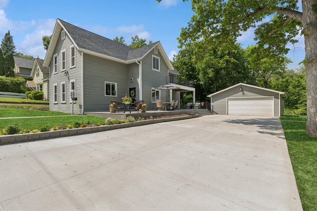 406 Mulberry St W, Stillwater, MN 55082 - view of front of home with an outdoor structure, a garage, a front lawn, and a shingled roof