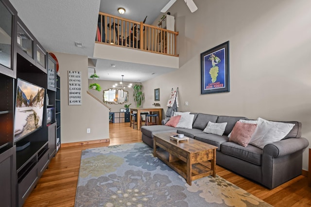 367 Ojibway Path, Lino Lakes, MN 55014 - living area featuring a chandelier and wood finished floors