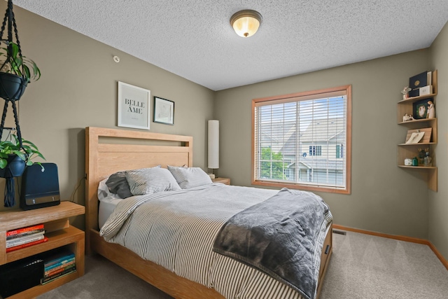 367 Ojibway Path, Lino Lakes, MN 55014 - bedroom with carpet floors, baseboards, and a textured ceiling