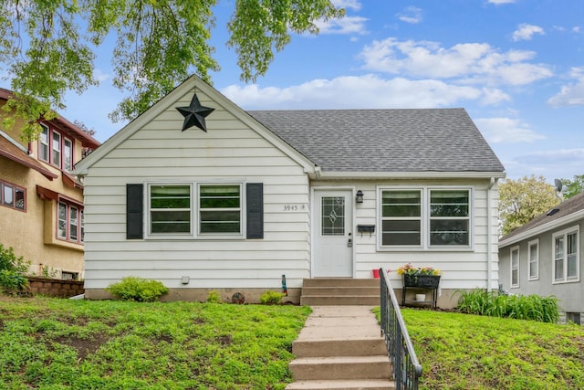 3945 15th Ave S, Minneapolis, MN 55407 - view of front of home featuring a shingled roof