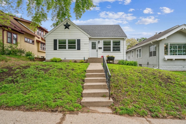 3945 15th Ave S, Minneapolis, MN 55407 - view of front of home with roof with shingles