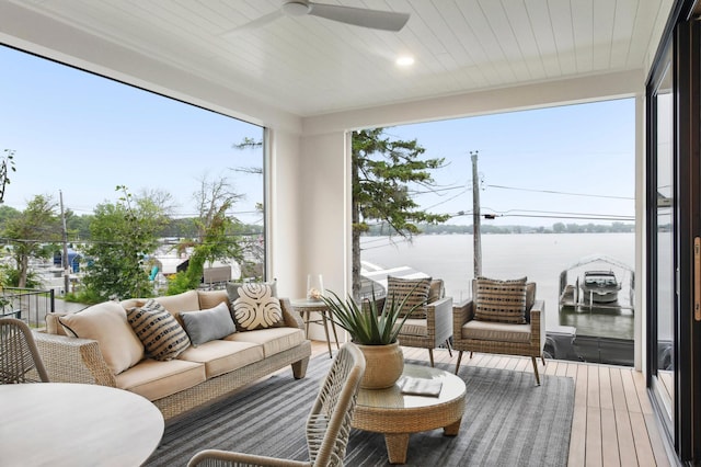 sunroom with a water view