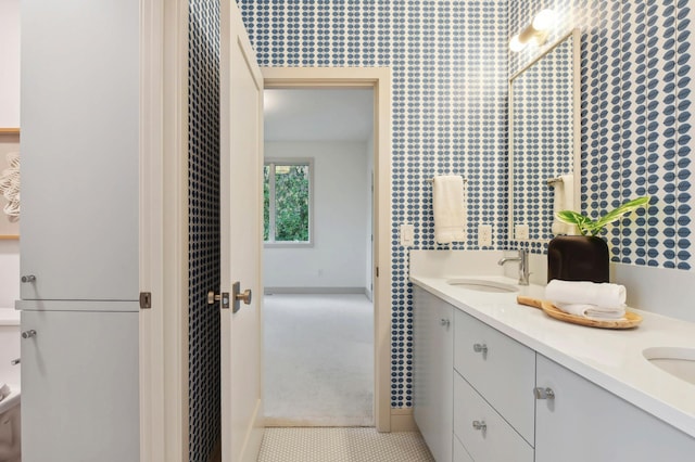 bathroom featuring double vanity, a heating unit, and tile patterned flooring