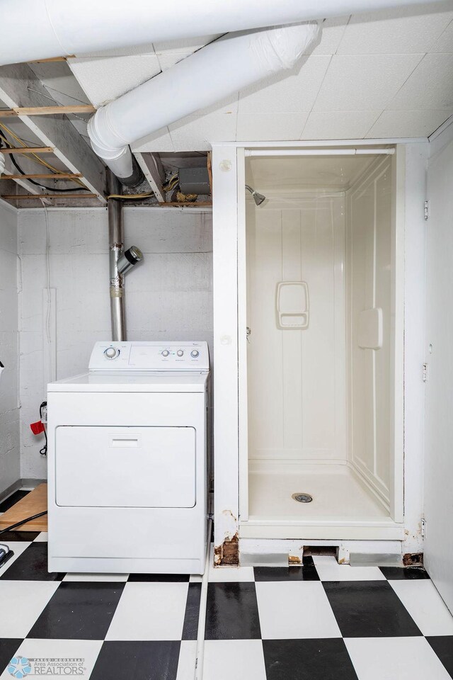 1209 5th St N, Fargo, ND 58102 - laundry room featuring washer / dryer and tile patterned floors