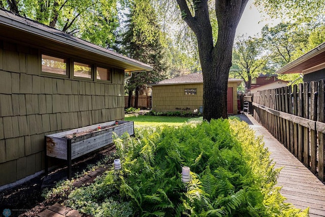 1209 5th St N, Fargo, ND 58102 - view of yard featuring a wooden deck