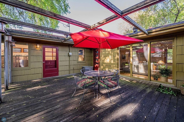 1209 5th St N, Fargo, ND 58102 - wooden terrace with outdoor dining area
