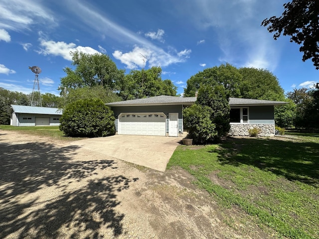 14390 Sperry Lake Rd, Harrison Twp, MN 56209 - view of front of house with driveway, a front yard, a garage, and stone siding
